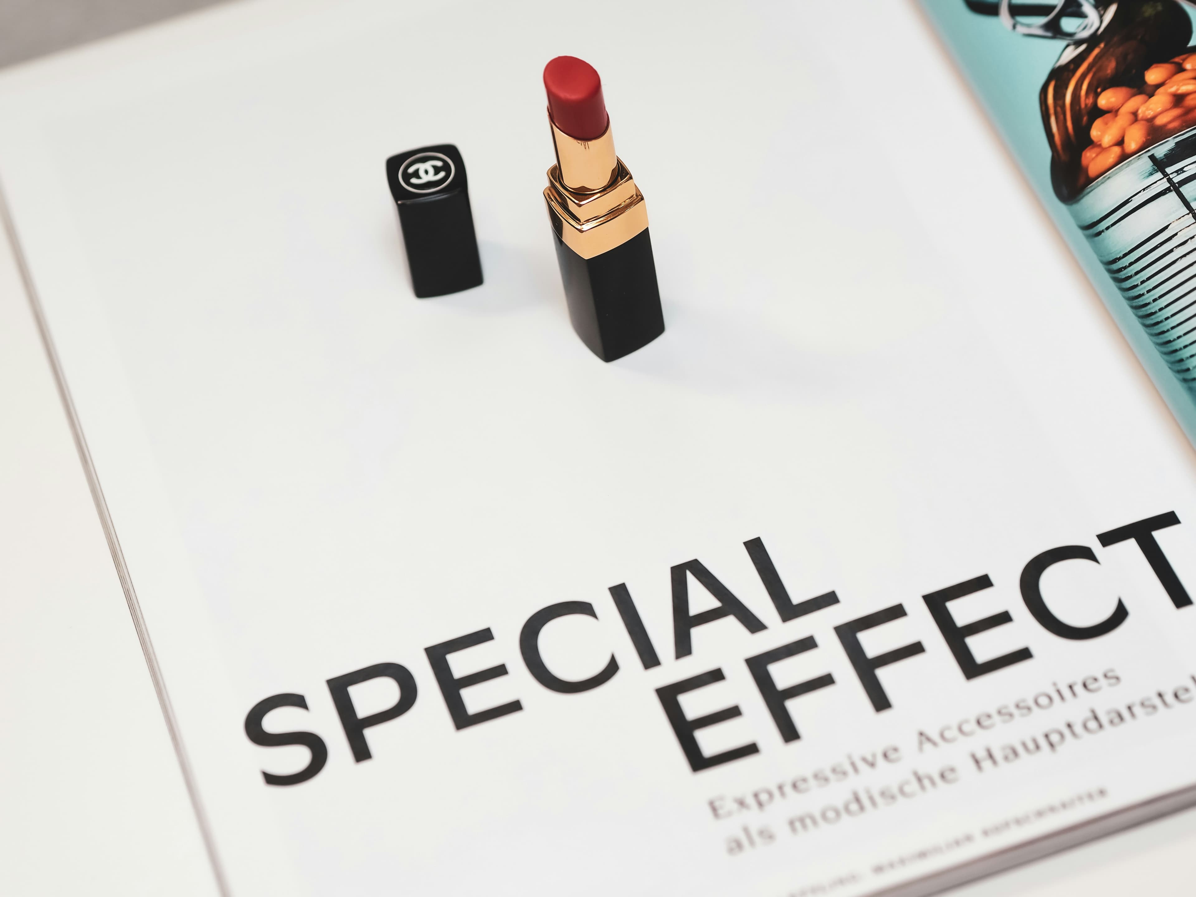Chanel lipstick displayed on a fashion magazine