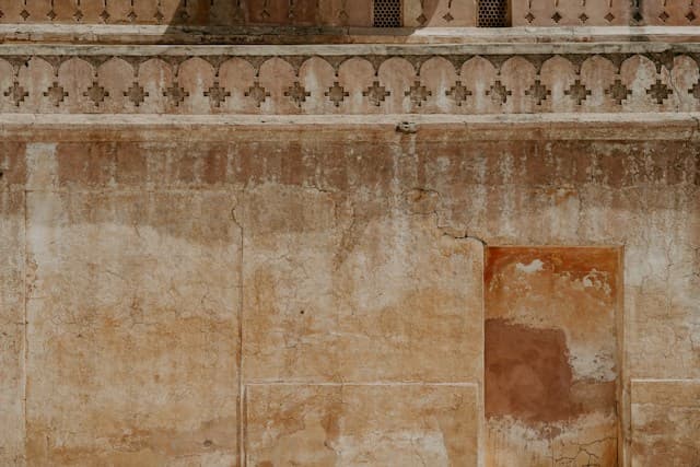 A weathered doorway and historic wall at Amber Palace in Jaipur